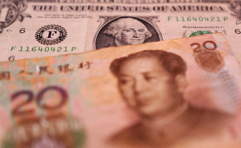 China's state banks seen supporting yuan as Moody's cuts outlook - sources