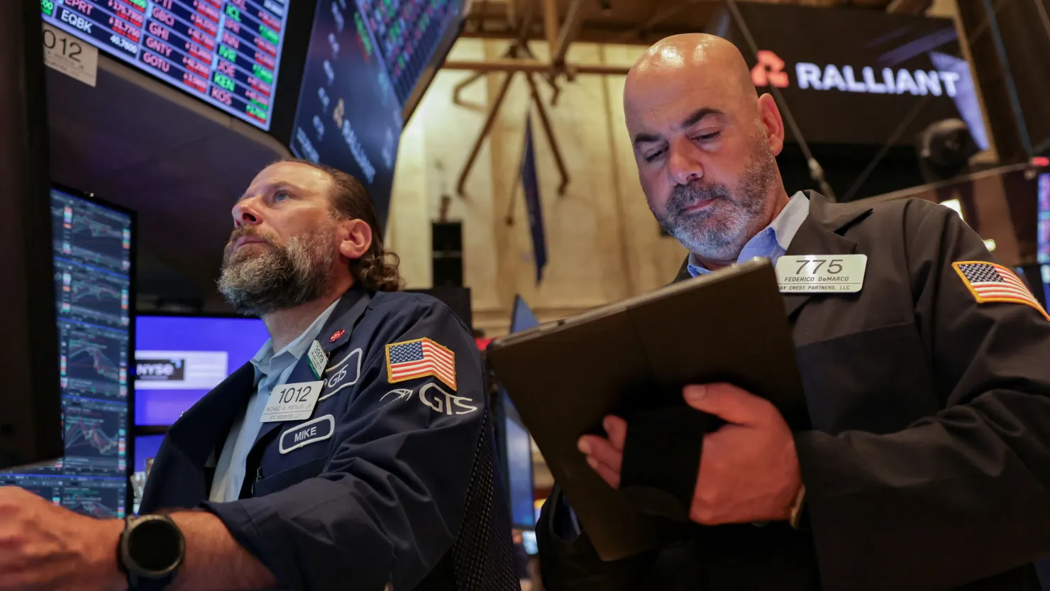 Traders work on the floor at the New York Stock Exchange (NYSE) in New York City, U.S., July 1, 2025. REUTERS/Jeenah Moon